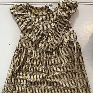 Kate Quinn sleeveless tan dress